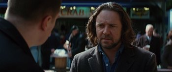 Movie still from “State of Play” (2009), directed by Kevin Macdonald – A person with long hair; Close Up shot, Over the shoulder angle