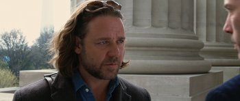 Movie still from “State of Play” (2009), directed by Kevin Macdonald – A person with long hair; Close Up shot, Over the shoulder angle