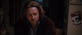 Movie still from “State of Play” (2009), directed by Kevin Macdonald – A person with long hair; Close Up shot, Over the shoulder angle