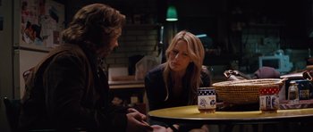 Movie still from “State of Play” (2009), directed by Kevin Macdonald – A man and a woman sitting at a table; Medium shot, Over the shoulder angle