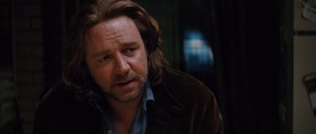 Movie still from “State of Play” (2009), directed by Kevin Macdonald – A person with long hair; Close Up shot, Over the shoulder angle