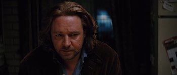 Movie still from “State of Play” (2009), directed by Kevin Macdonald – A person with long hair; Close Up shot, Over the shoulder angle