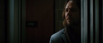 Movie still from “State of Play” (2009), directed by Kevin Macdonald – A person wearing a suit and tie; Close Up shot, Low angle