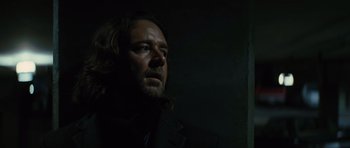 Movie still from “State of Play” (2009), directed by Kevin Macdonald – A person in a dark room; Close Up shot, Low angle