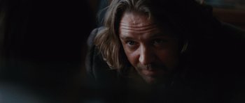 Movie still from “State of Play” (2009), directed by Kevin Macdonald – A person with long hair; Close Up shot, Over the shoulder angle