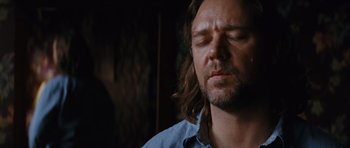 Movie still from “State of Play” (2009), directed by Kevin Macdonald – A person with long hair; Close Up shot, Low angle