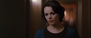 Movie still from “State of Play” (2009), directed by Kevin Macdonald – A person with short brown hair; Close Up shot, Over the shoulder angle