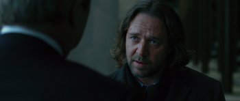 Movie still from “State of Play” (2009), directed by Kevin Macdonald – A person talking to another person; Close Up shot, Over the shoulder angle