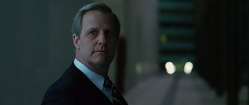 Movie still from “State of Play” (2009), directed by Kevin Macdonald – A person wearing a suit and tie; Close Up shot, Low angle