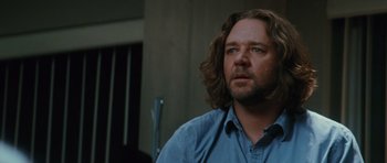 Movie still from “State of Play” (2009), directed by Kevin Macdonald – A person with long hair; Close Up shot, Over the shoulder angle