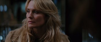 Movie still from “State of Play” (2009), directed by Kevin Macdonald – A person with long blonde hair; Close Up shot, Over the shoulder angle