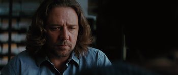 Movie still from “State of Play” (2009), directed by Kevin Macdonald – A person with long hair; Close Up shot, Over the shoulder angle