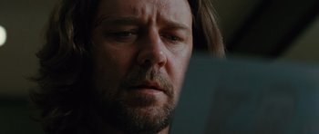 Movie still from “State of Play” (2009), directed by Kevin Macdonald – A man's face as he stares into the distance; Close Up shot, Low angle