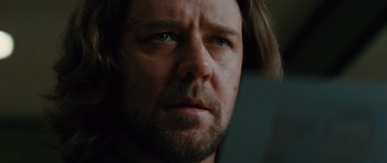 Movie still from “State of Play” (2009), directed by Kevin Macdonald – A person with long hair and a beard; Close Up shot, Low angle