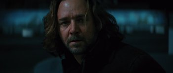 Movie still from “State of Play” (2009), directed by Kevin Macdonald – A person with long hair and a beard; Close Up shot, Low angle