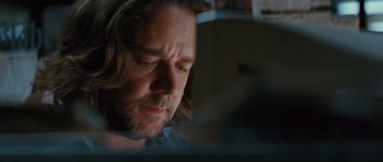 Movie still from “State of Play” (2009), directed by Kevin Macdonald – A person looking at a computer screen; Close Up shot, Low angle