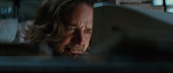 Movie still from “State of Play” (2009), directed by Kevin Macdonald – A person looking at a computer screen; Close Up shot, Low angle