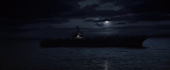 Movie still from “Stealth” (2005), directed by Rob Cohen – A ship in a body of water at night; Extreme Wide shot, Low angle