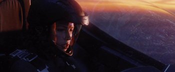 Movie still from “Stealth” (2005), directed by Rob Cohen – A person wearing a helmet in a plane; Close Up shot, Low angle