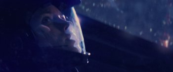 Movie still from “Stealth” (2005), directed by Rob Cohen – A person is holding a cell phone up to their face; Close Up shot, Low angle