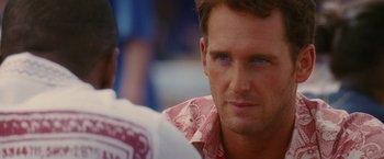 Movie still from “Stealth” (2005), directed by Rob Cohen – A person wearing a hawaiian shirt; Close Up shot, Over the shoulder angle