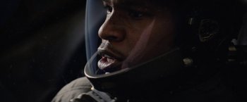 Movie still from “Stealth” (2005), directed by Rob Cohen – A person wearing a helmet; Close Up shot, Low angle