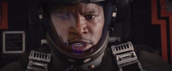 Movie still from “Stealth” (2005), directed by Rob Cohen – A person wearing a helmet; Close Up shot, High angle