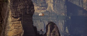 Movie still from “Stealth” (2005), directed by Rob Cohen – A balloon is flying over a mountain range; Extreme Wide shot, High angle