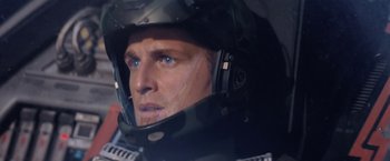 Movie still from “Stealth” (2005), directed by Rob Cohen – A person wearing a helmet; Close Up shot, Over the shoulder angle