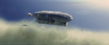 Movie still from “Stealth” (2005), directed by Rob Cohen – An airship floating in the sky on a cloudy day; Extreme Wide shot, Low angle