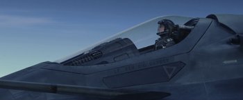 Movie still from “Stealth” (2005), directed by Rob Cohen – A fighter jet pilot sitting in the cockpit of an aircraft; Wide shot, Low angle