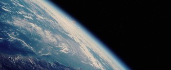 Movie still from “Stealth” (2005), directed by Rob Cohen – A view of the earth taken from a space station; Extreme Wide shot, Overhead angle