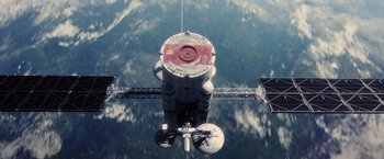 Movie still from “Stealth” (2005), directed by Rob Cohen – A view of the top of a space station from above; Extreme Wide shot, Overhead angle