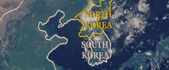 Movie still from “Stealth” (2005), directed by Rob Cohen – A map of north and south korea on a satellite image; Extreme Wide shot, Overhead angle