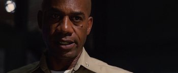 Movie still from “Stealth” (2005), directed by Rob Cohen – A person wearing a shirt; Close Up shot, Low angle