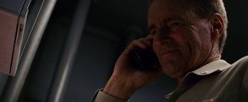 Movie still from “Stealth” (2005), directed by Rob Cohen – A person talking on a cell phone; Close Up shot, Low angle