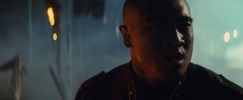 Movie still from “Stealth” (2005), directed by Rob Cohen – A person wearing a military uniform; Close Up shot, Low angle