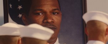 Movie still from “Stealth” (2005), directed by Rob Cohen – A person holding a cup in his hand; Close Up shot, Low angle
