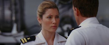 Movie still from “Stealth” (2005), directed by Rob Cohen – A person wearing a uniform; Close Up shot, Over the shoulder angle