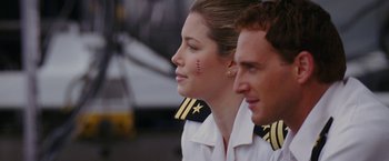 Movie still from “Stealth” (2005), directed by Rob Cohen – A man and a woman in military uniforms; Close Up shot, Over the shoulder angle