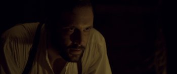 Movie still from “Still” (2018), directed by Takashi Doscher – A person wearing a white shirt; Close Up shot, Over the shoulder angle
