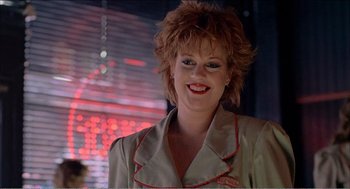 Movie still from “Stormy Monday” (1988), directed by Mike Figgis – A person wearing a jacket; Close Up shot, Low angle