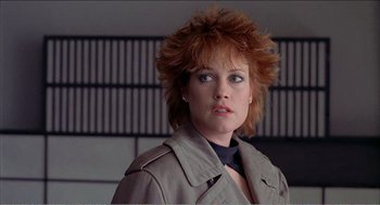 Movie still from “Stormy Monday” (1988), directed by Mike Figgis – A person wearing a jacket; Close Up shot, Low angle