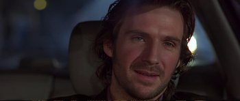 Movie still from “Strange Days” (1995), directed by Kathryn Bigelow – A person with long hair; Close Up shot, Over the shoulder angle