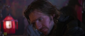 Movie still from “Strange Days” (1995), directed by Kathryn Bigelow – A person with long brown hair; Close Up shot, Over the shoulder angle