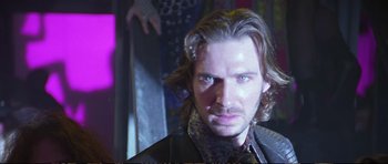 Movie still from “Strange Days” (1995), directed by Kathryn Bigelow – A person with long hair; Close Up shot, Low angle