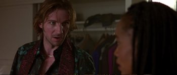 Movie still from “Strange Days” (1995), directed by Kathryn Bigelow – A man and a woman are talking in a closet; Close Up shot, Over the shoulder angle