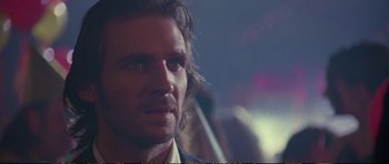 Movie still from “Strange Days” (1995), directed by Kathryn Bigelow – A person with long hair; Close Up shot, Over the shoulder angle