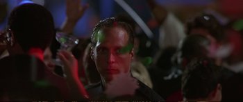 Movie still from “Strange Days” (1995), directed by Kathryn Bigelow – A person with green eyes; Close Up shot, Low angle