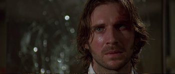 Movie still from “Strange Days” (1995), directed by Kathryn Bigelow – A person with wet hair; Close Up shot, Low angle